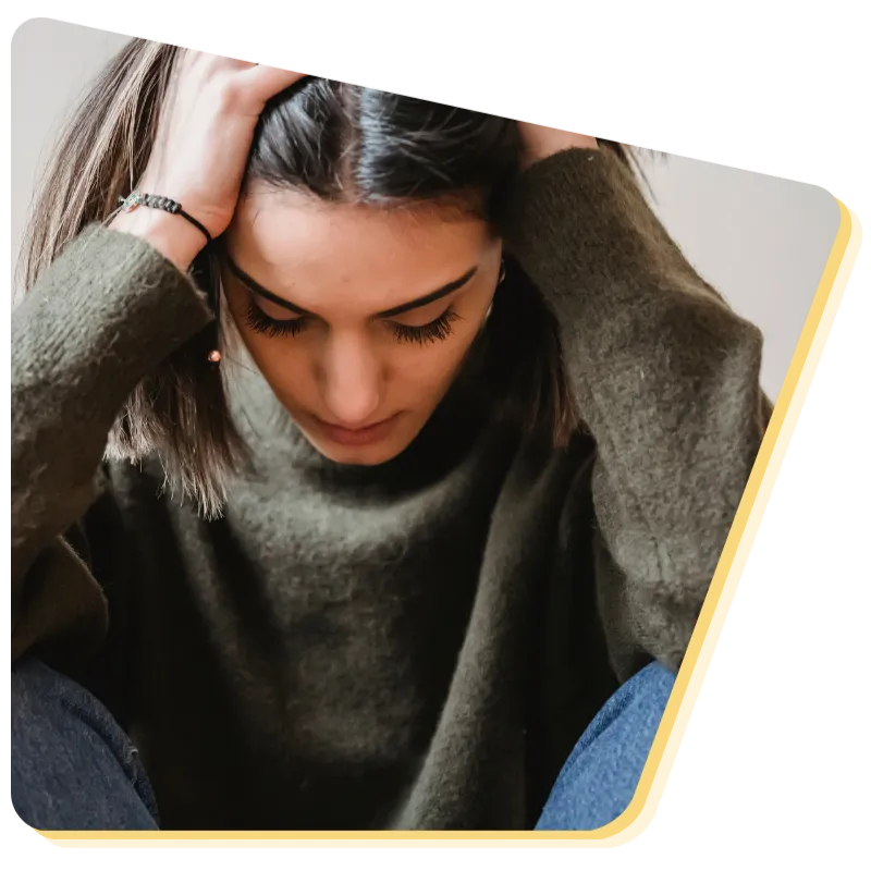 Calm young person reflecting on wellbeing and managing anxiety